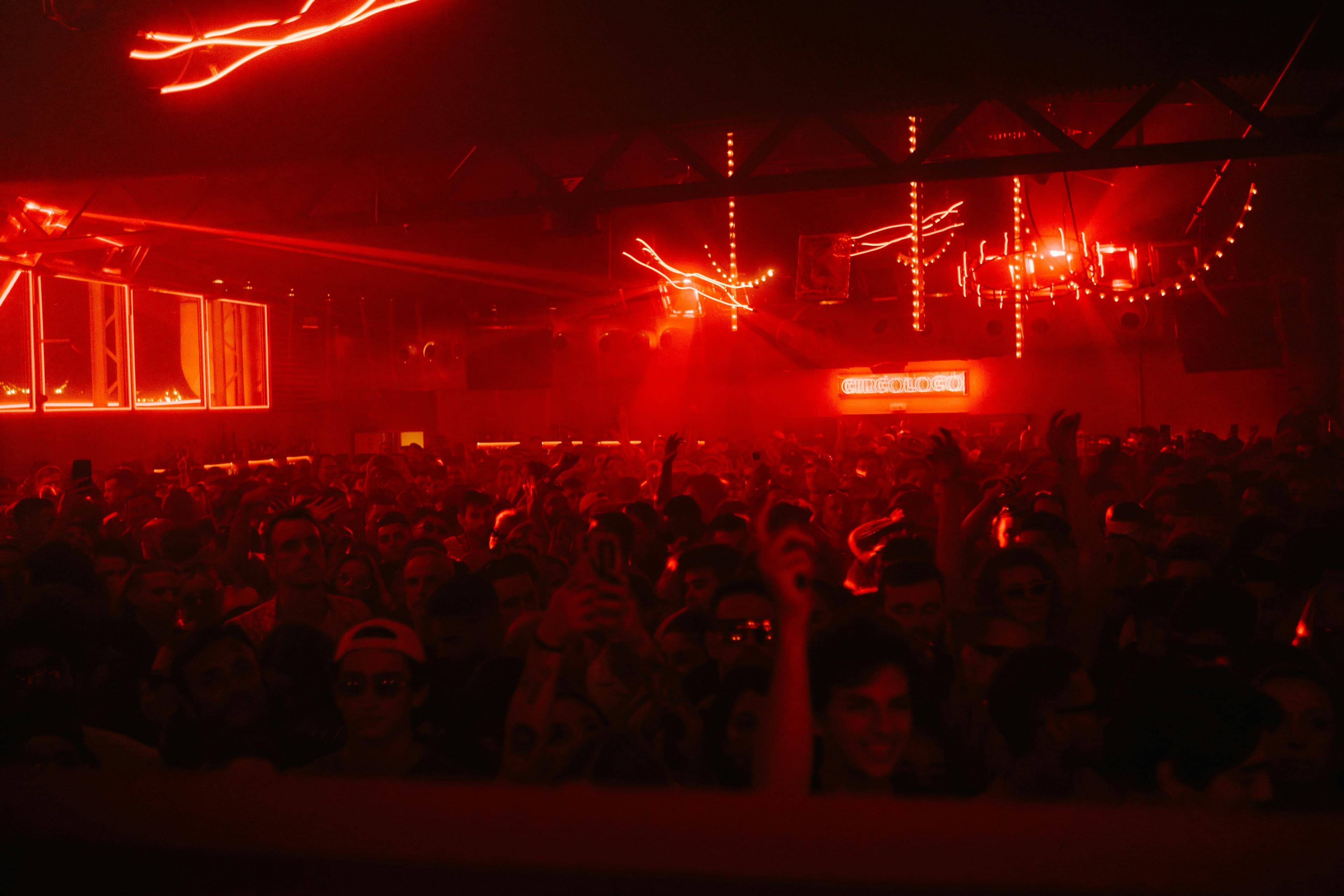 NOIR main floor — dark stage with atmospheric crowd lighting